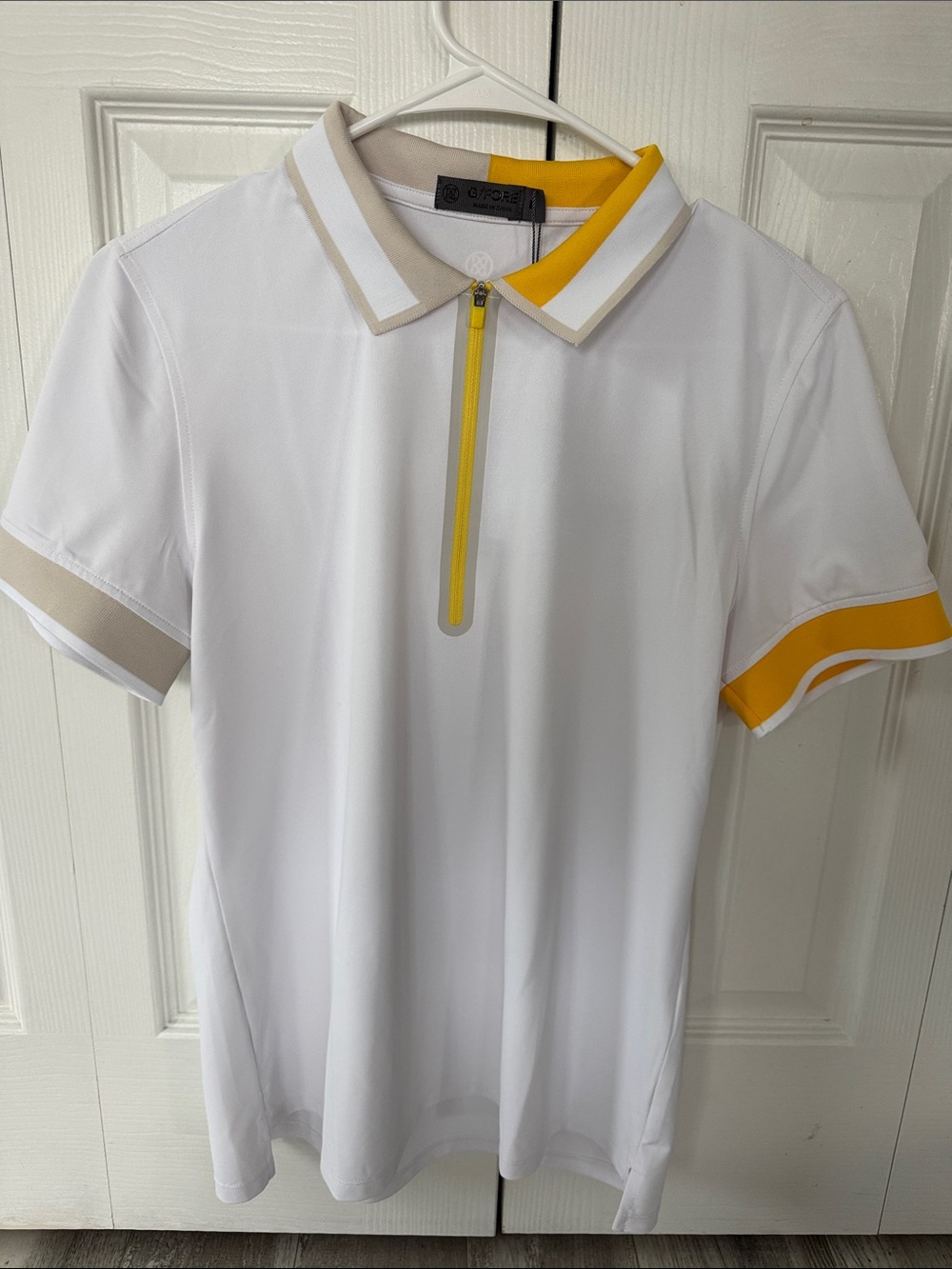 White Polo Shirt with Yellow Accent - Women’s Zip Collar golf shirt